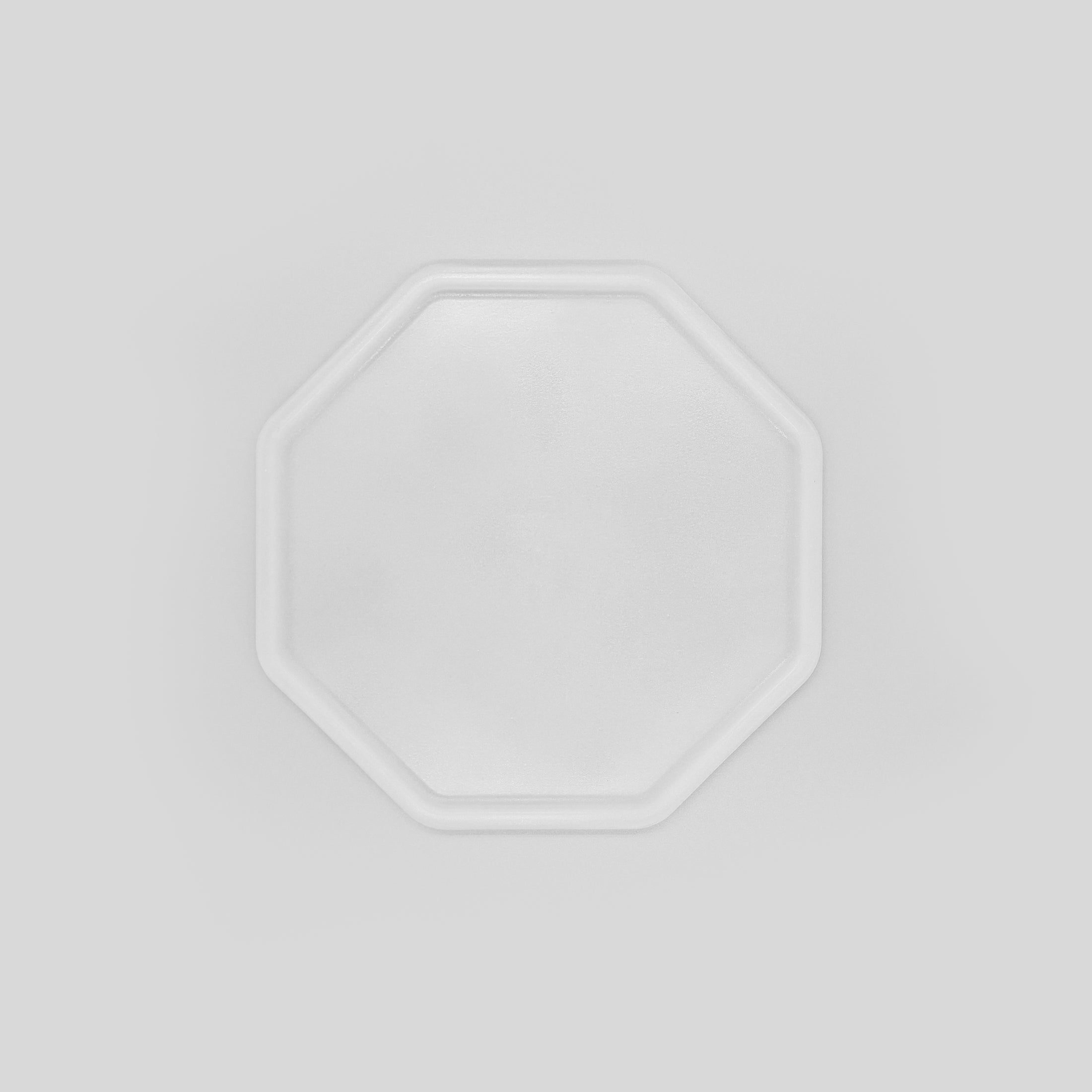 8-eckige farblose Silikonunterlage für Katzengeschirr, Länge 24,5 cm und Breite 24,5 cm – Ansicht von oben