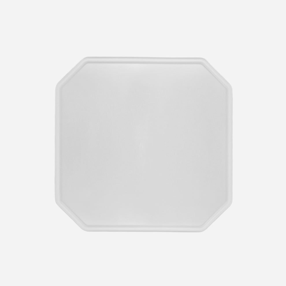 Octagonal colourless silicone placemat for cats, length 56 cm and width 56 cm – diagonally from above view