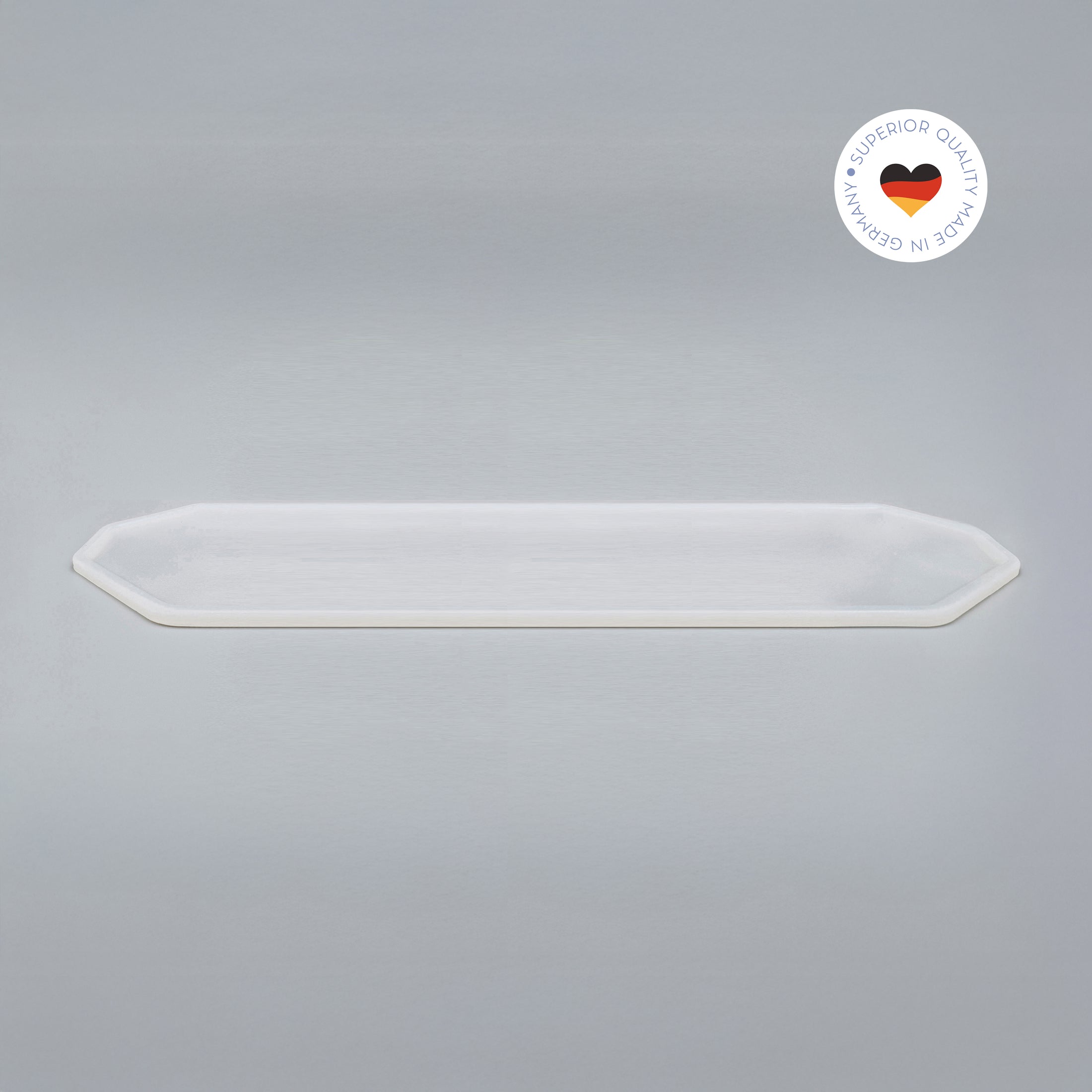 8-eckige farblose Silikonunterlage für Katzengeschirr, Länge 86,5 cm und Breite 24,5 cm – Ansicht von schräg oben