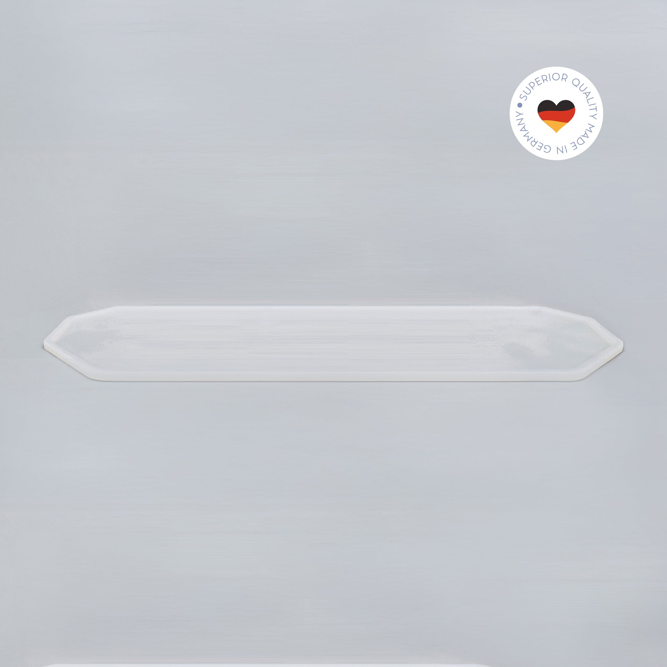 8-eckige farblose Silikonunterlage für Katzengeschirr, Länge 96,5 cm und Breite 27,5 cm – Ansicht von schräg oben