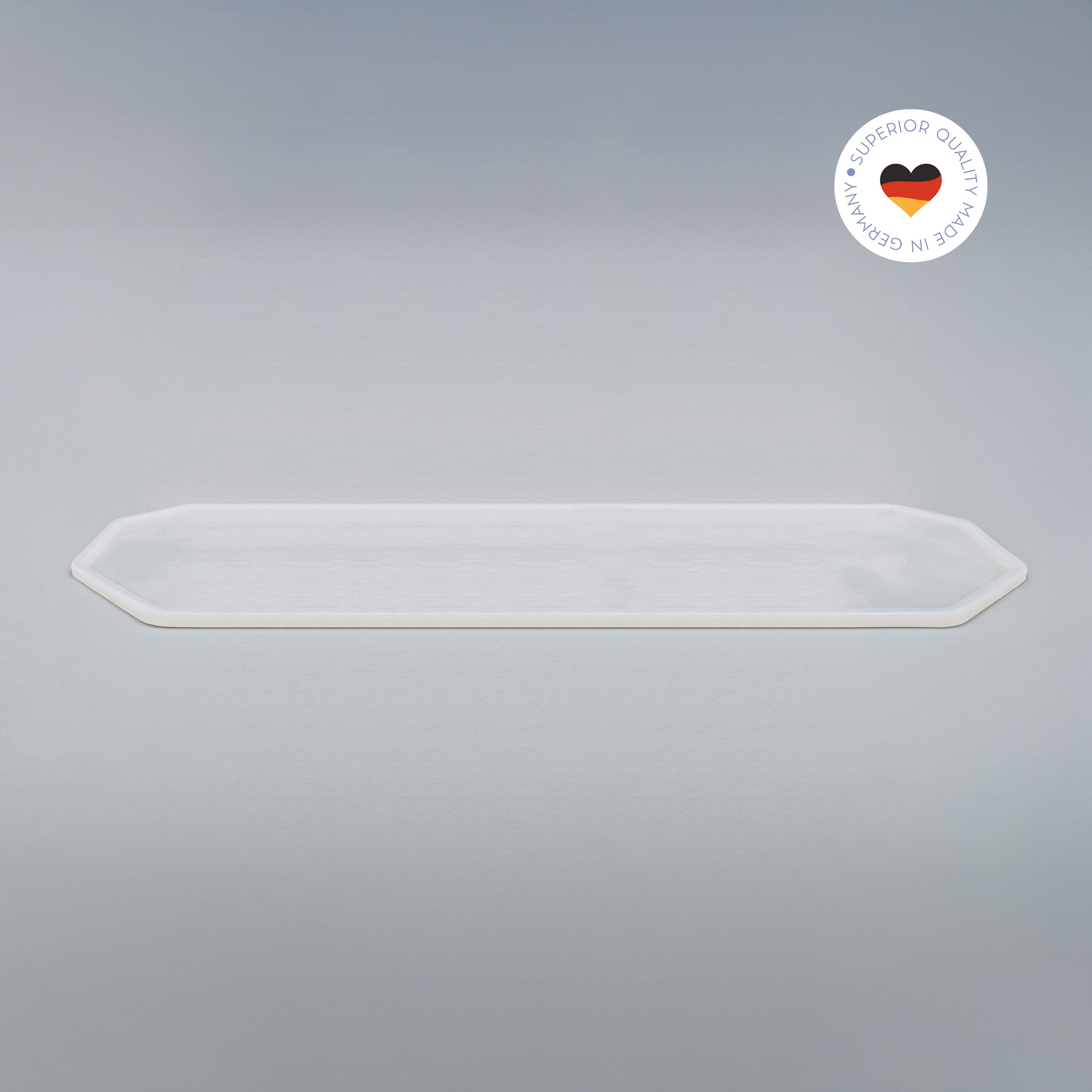 8-eckige farblose Silikonunterlage für Katzengeschirr, Länge 107,5 cm und Breite 30,5 cm – Ansicht von schräg oben