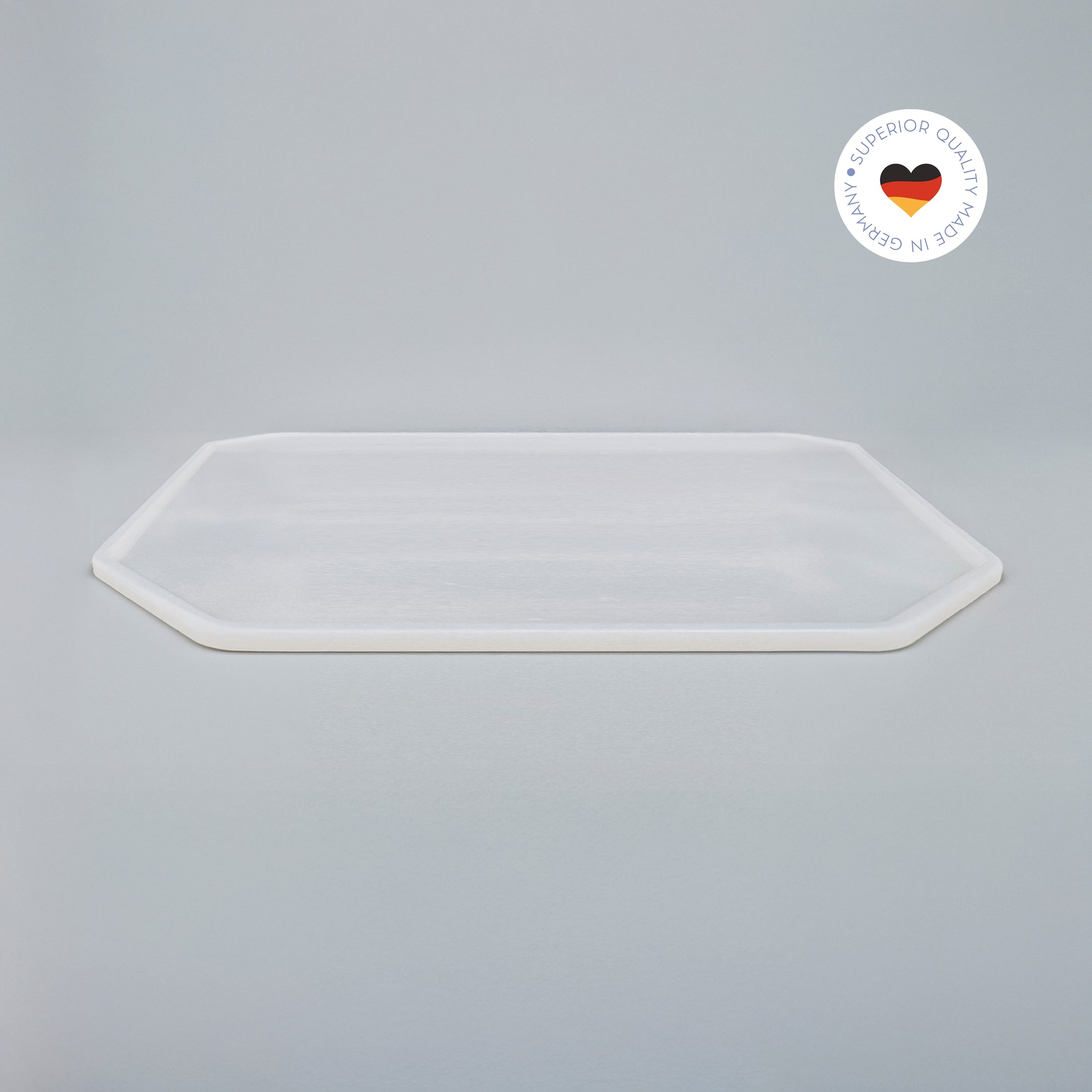 8-eckige farblose Silikonunterlage für Katzengeschirr, Länge 50,5 cm und Breite 50,5 cm – Ansicht von schräg oben