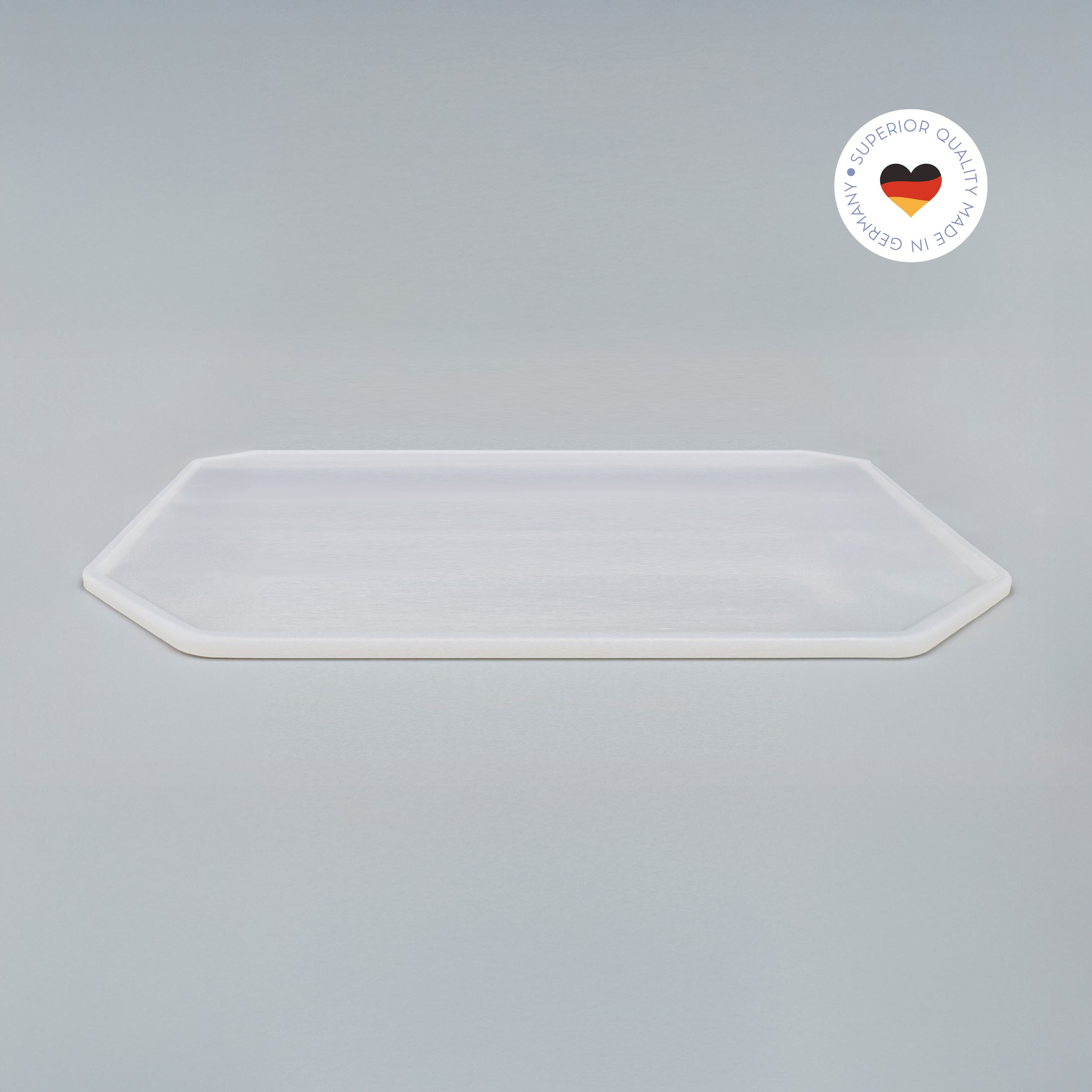 8-eckige farblose Silikonunterlage für Katzengeschirr, Länge 56 cm und Breite 56 cm – Ansicht von schräg oben