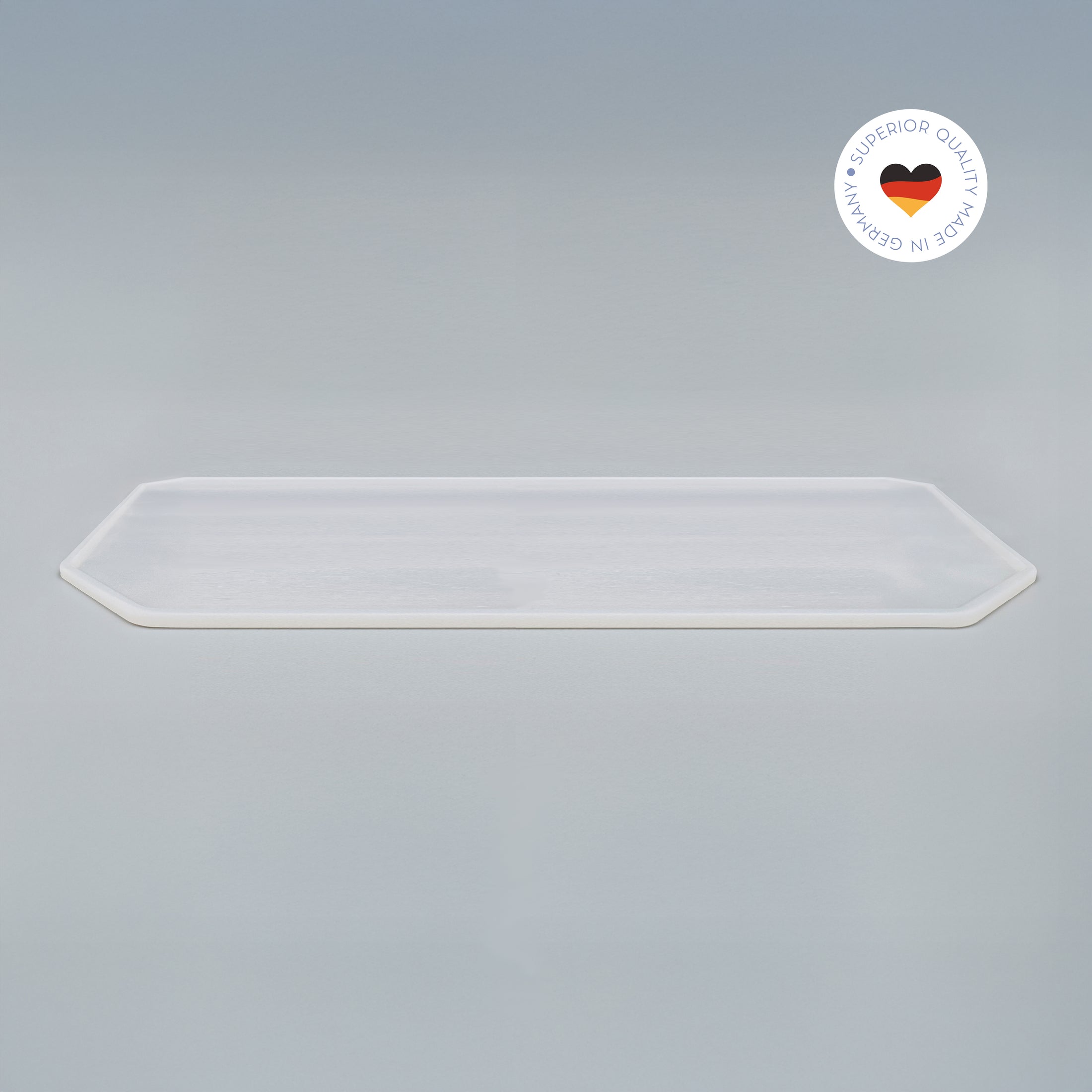 8-eckige farblose Silikonunterlage für Katzengeschirr, Länge 81,5 cm und Breite 56 cm – Ansicht von schräg oben