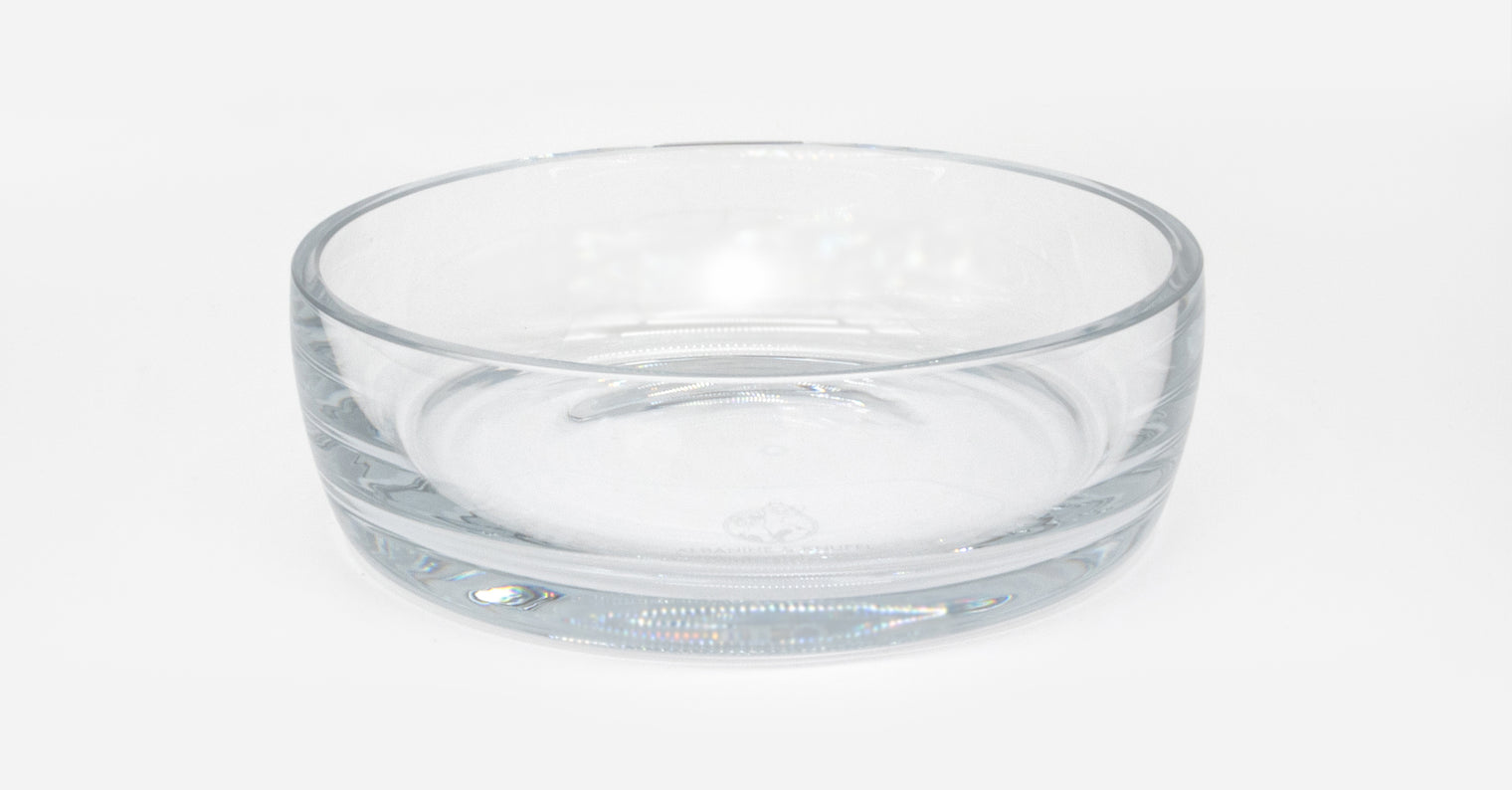 Close-up of a colourless crystal glass drinking bowl for cats by Albanine & Knuffl