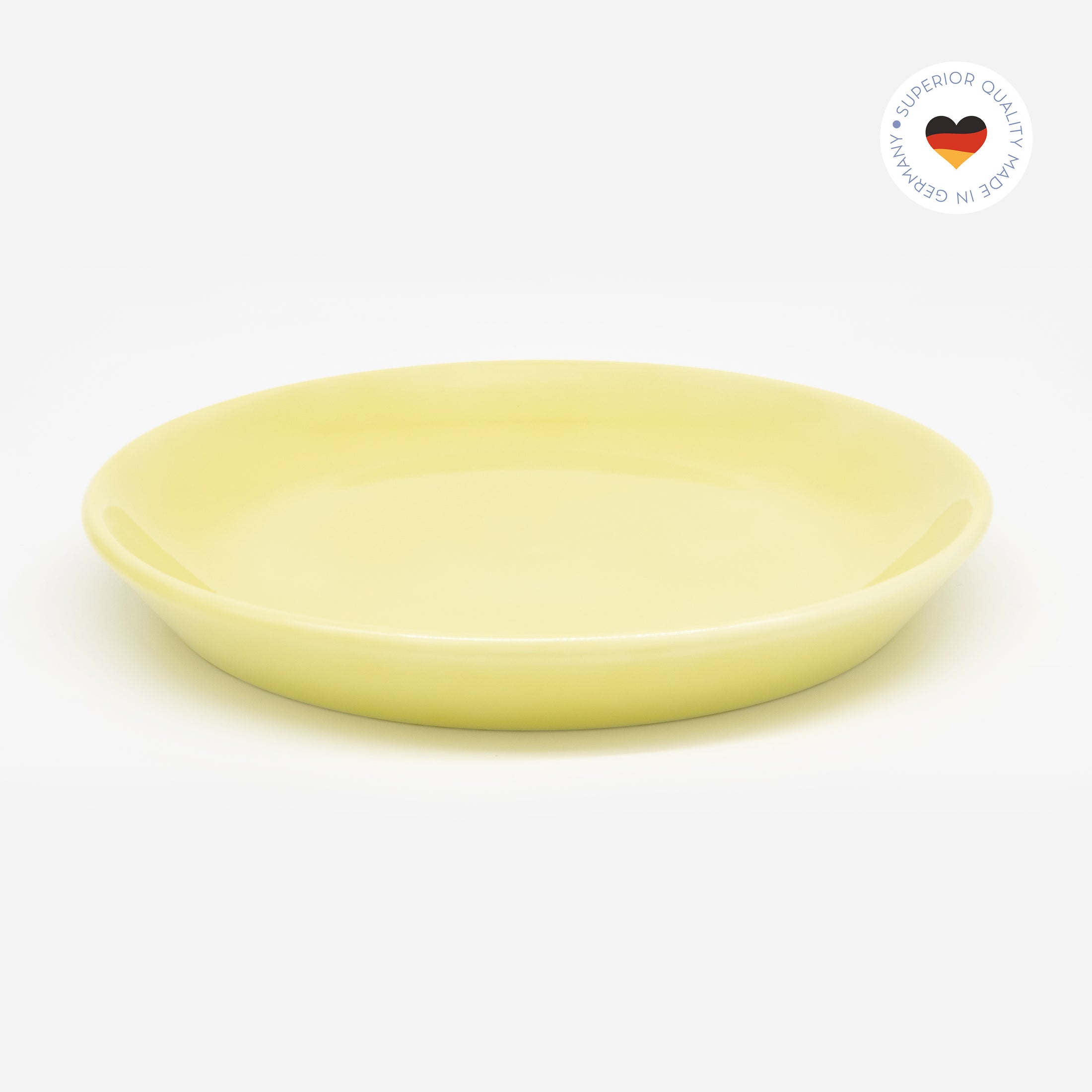 Gelber Katzenteller aus Porzellan in Größe 20 cm – Ansicht von schräg oben (Faded Linden Yellow)