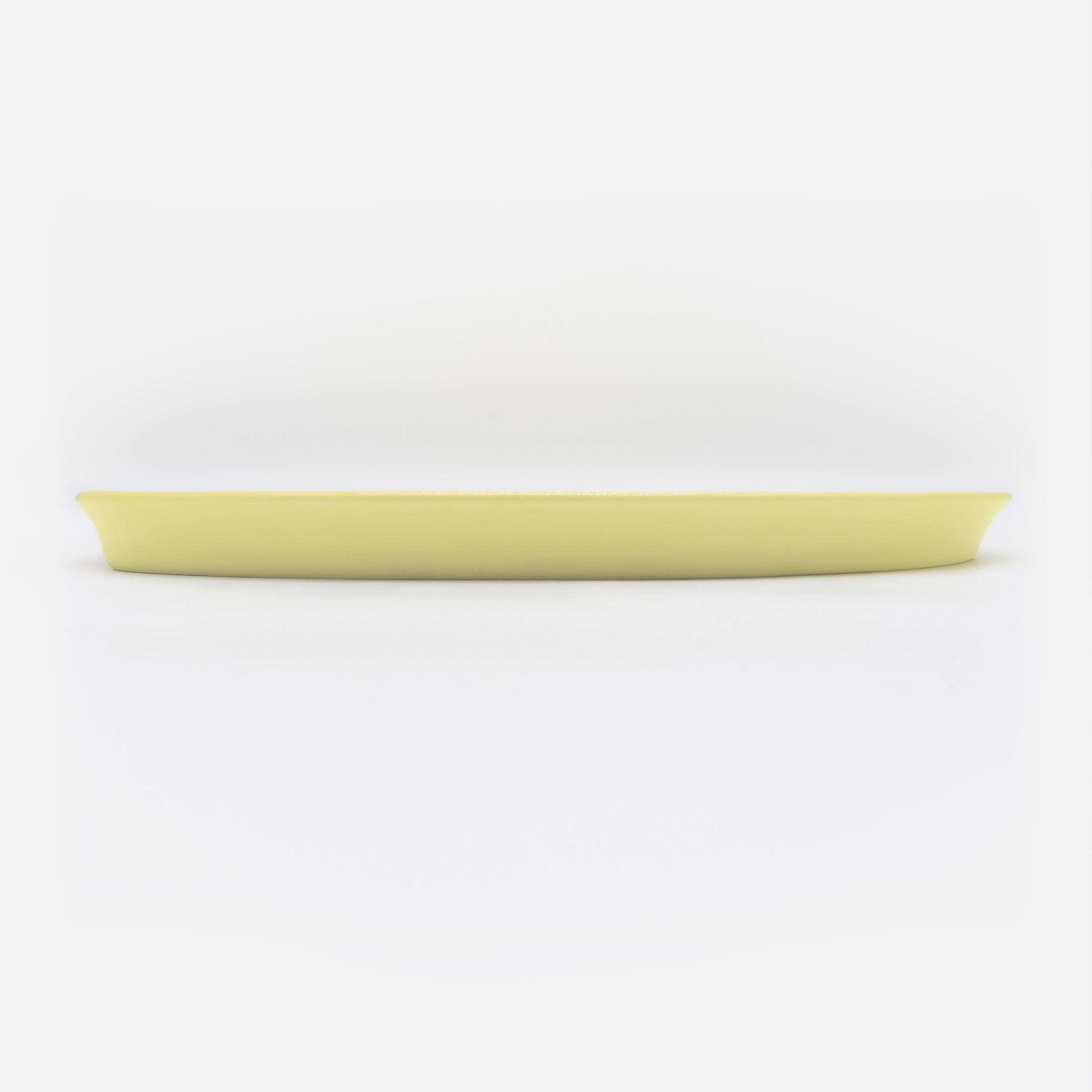 Seitenansicht gelber Katzenteller aus Porzellan in Größe 42 cm (Faded Linden Yellow)