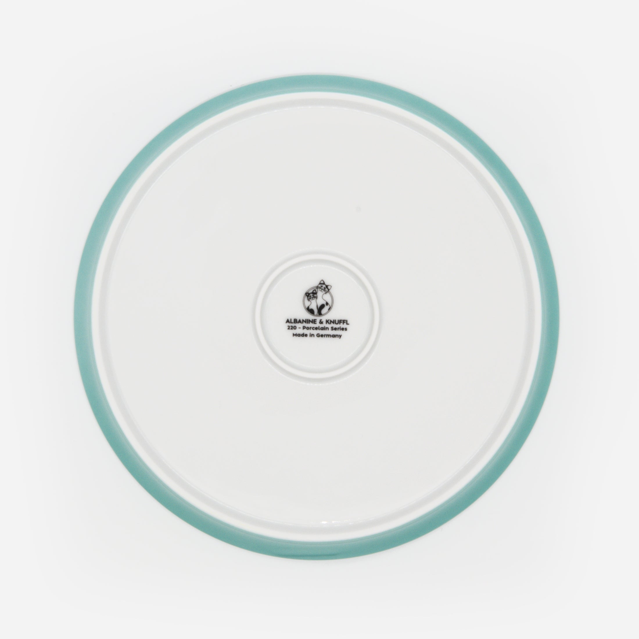 Rückseite Katzenteller türkis aus Porzellan in Größe 22 cm mit Füßen und Bodenmarke – Ansicht von oben (Jungle Dawn)