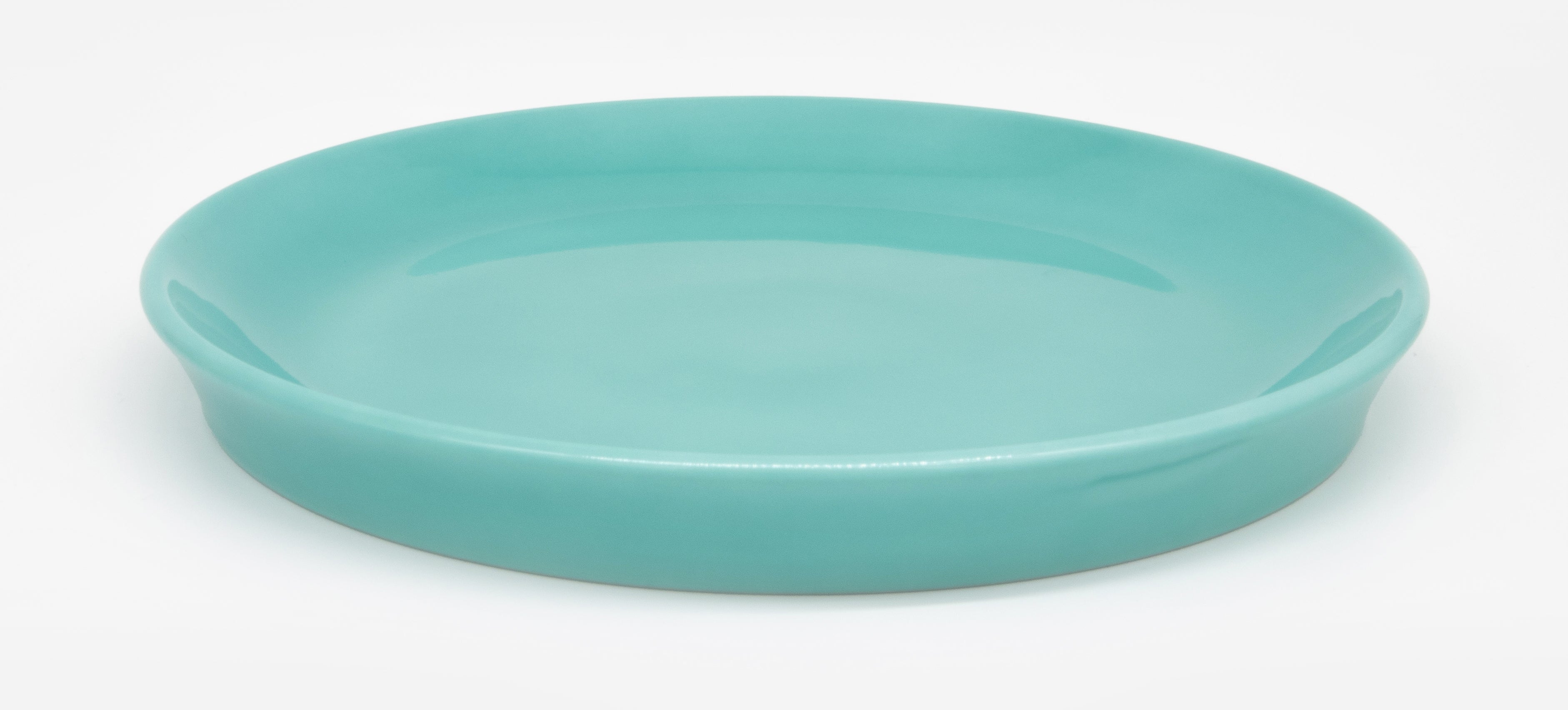 Nahaufnahme Katzenteller türkis aus Porzellan in Größe 22 cm – Ansicht von schräg oben